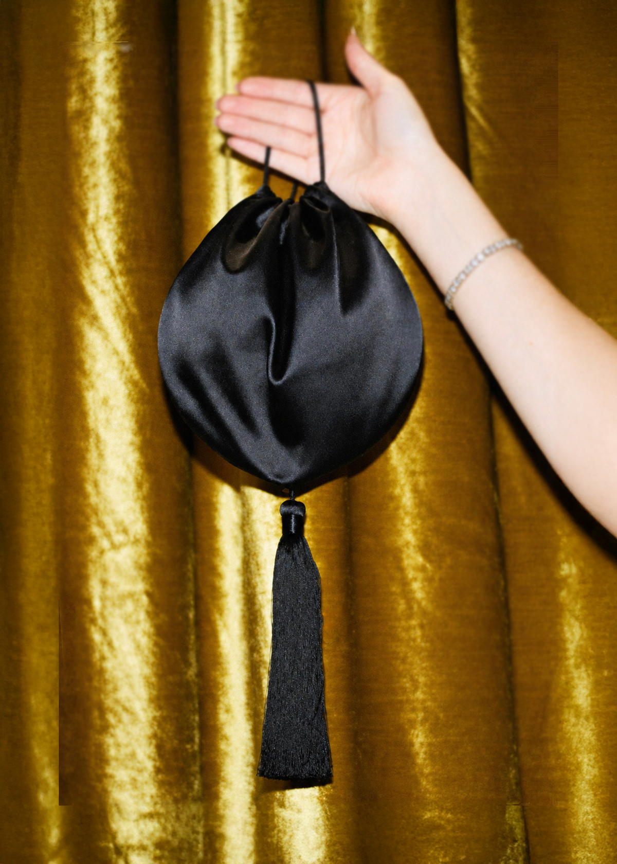 Jumbo Tassel Pochette in Black